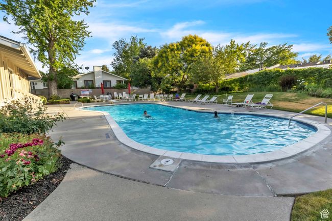 Community pool featuring a patio area | Image 26