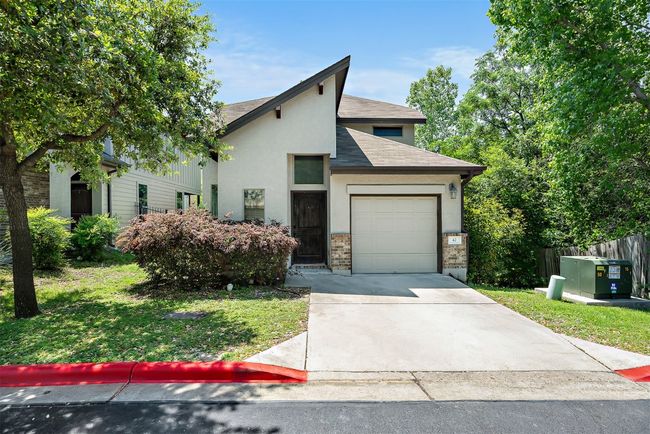 The front of the home feels calm and tucked away, positioned on a cul-de-sac with no shared walls and extra space on all sides | Image 32