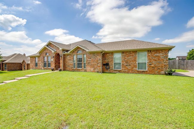 View of front of house with a front yard. | Image 5