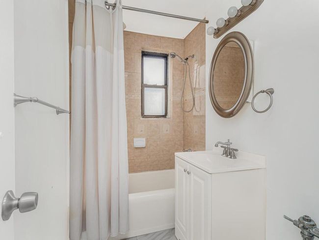 Full bathroom with shower / bath combo and vanity | Image 8