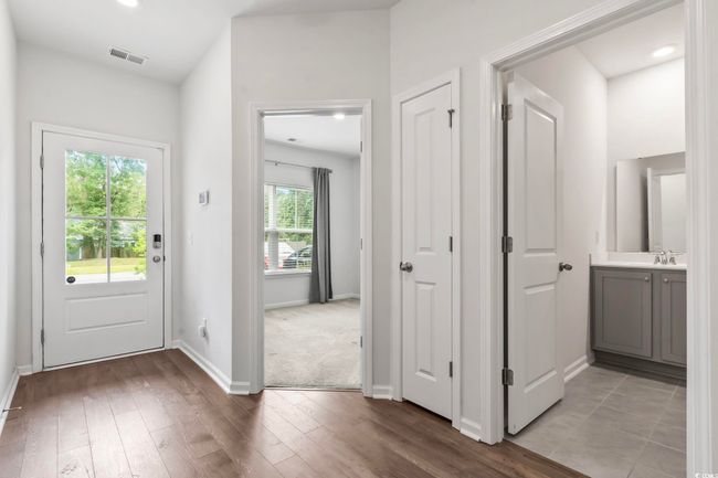 Foyer featuring wood finished floors and recessed lighting | Image 9