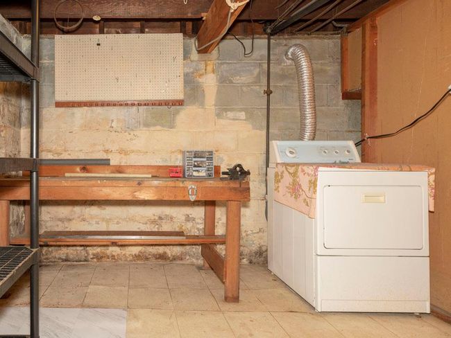 Unfinished basement with washer / clothes dryer | Image 37