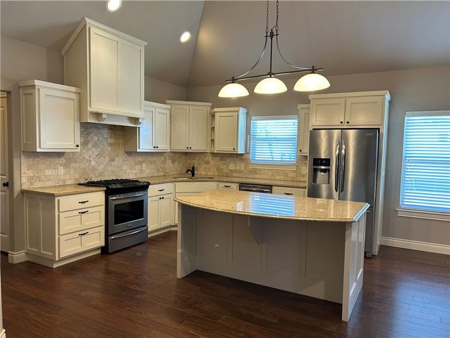 Kitchen with refrigerator provided | Image 11