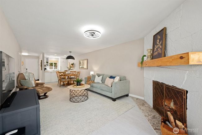 Ambience with a wood-burning fireplace. | Image 13