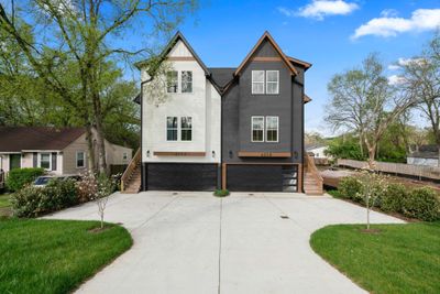 A well-laid out driveway with room to navigate in and out of the property. Each unit accommodates four parked cars: two in its over-sized attached garage and two outside in its dedicated parking pad. | Image 3