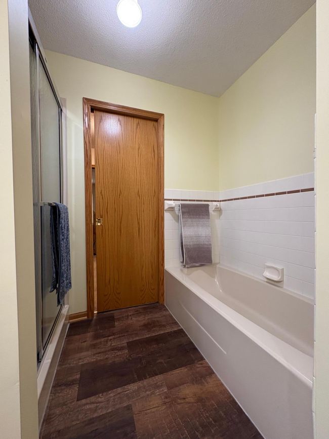 main floor bath tub and separate shower | Image 26