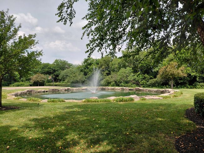 Beautiful entrance and common area with a basketball 🏀 court and water fountain. | Image 13