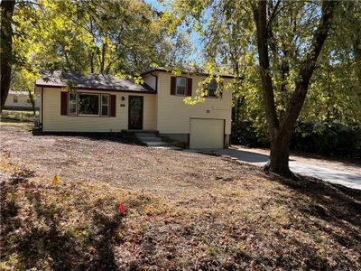 Tri-level home featuring a garage | Image 3