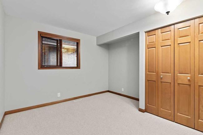 76 Coach Gate Way Sw, House other with 3 bedrooms, 2 bathrooms and 4 parking in Calgary AB | Image 22