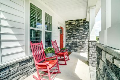 Relax and watch the world go by from your inviting Front Porch | Image 2