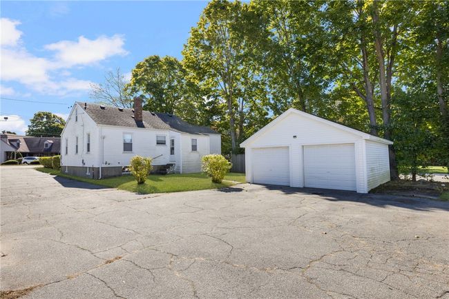 Back of 576 East Main house and detached two car garage. | Image 45