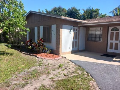 7708 Sw 9th St, House other with 4 bedrooms, 2 bathrooms and null parking in North Lauderdale FL | Image 1