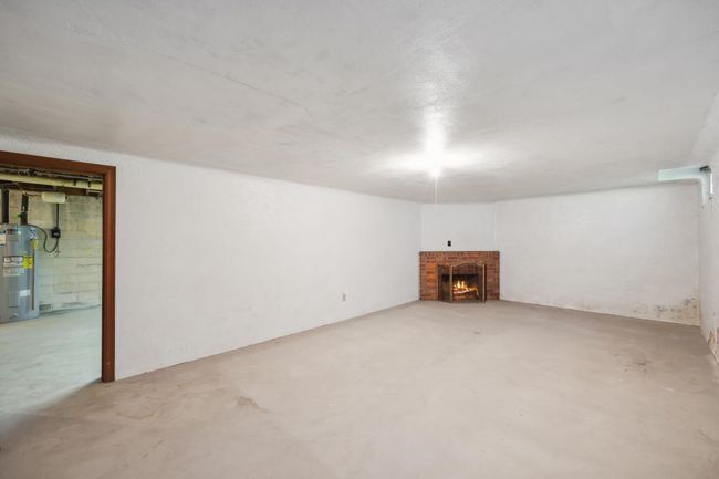 This lower level room could be finished off to make a cozy family room. Adding even more living space and equity to your new home. | Image 22