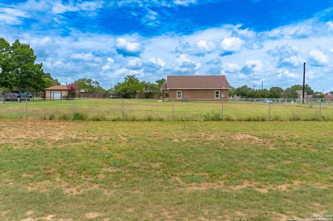 Large yard offers room to play or entertain | Image 30