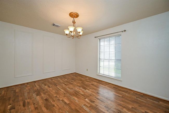Another view of the dining room. | Image 9