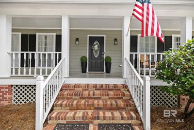 View of exterior entry featuring covered porch | Image 2