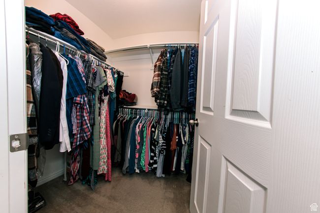 View of walk-in closet with plenty of room for all your favorites! | Image 18
