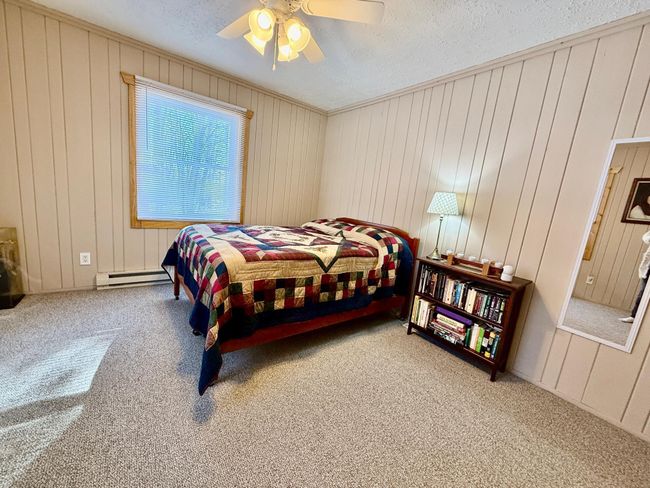 Bed 2 with new paint, lighting, carpet and knock down ceilings | Image 23
