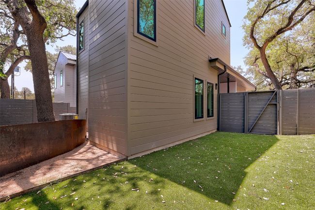 View of property exterior featuring a gate | Image 25
