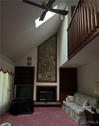 Living room with vaulted ceiling | Image 2