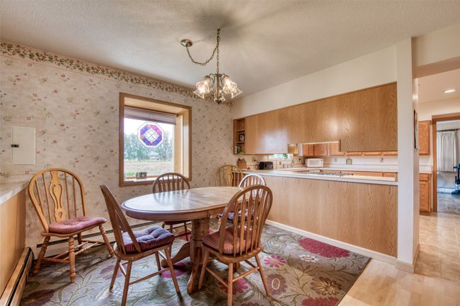 View of kitchen/breakfast nook area | Image 29