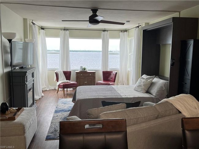 Murphy bed and living room | Image 5