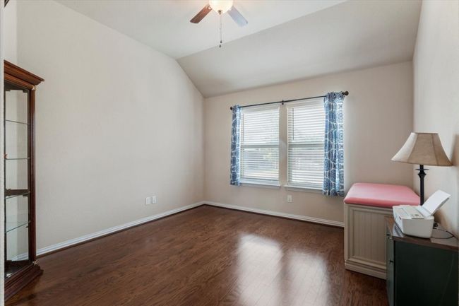 Extra flex room off living room has hardwood floors, high ceiling and is perfect for office, craft room, collections or playroom. | Image 29