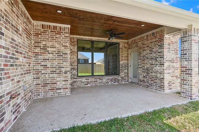 View of patio featuring ceiling fan | Image 20