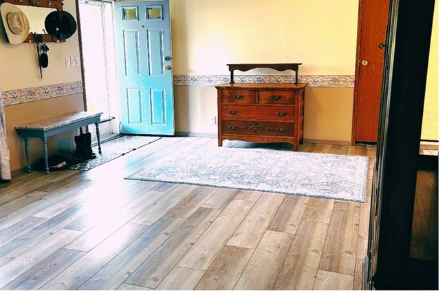 The rooms are flooded with light! This is the entryway or can be a second living room! | Image 5