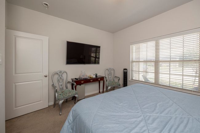 Bedroom featuring carpet flooring and baseboards | Image 24