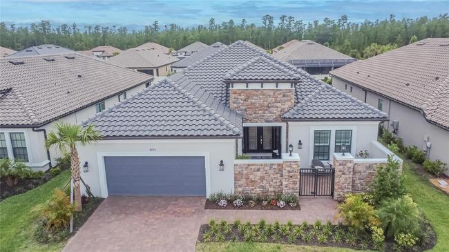 4795 Freccia Loop, House other with 3 bedrooms, 3 bathrooms and null parking in WESLEY CHAPEL FL | Image 58