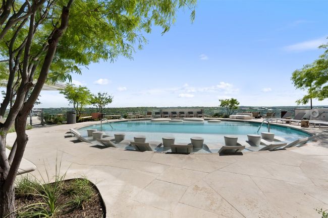 Pool featuring a patio area | Image 24