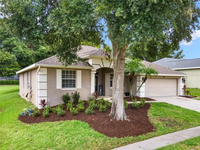 Recently refreshed landscaping creates a welcoming and charming first impression as you arrive at the property. | Image 3