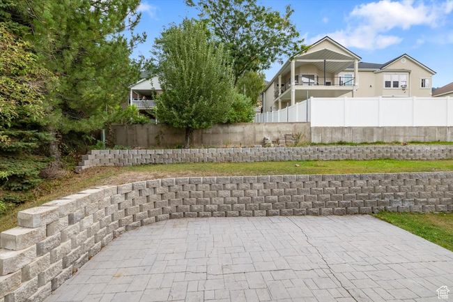 View of patio featuring a balcony | Image 39
