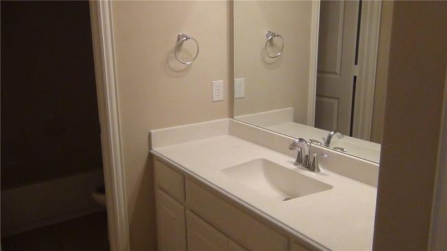 Bathroom with vanity and toilet | Image 18