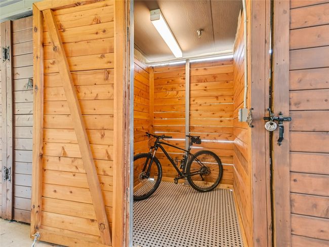 The new owner of Unit #1501 also gets a nicely floor-lined storage unit located in the garage. A real bonus as not every Waterfall homeowner gets one! | Image 27
