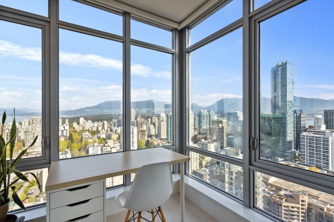Sunroom / solarium featuring a view of city and a mountain view | Image 10