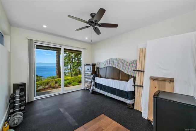 Bedroom featuring access to outside, recessed lighting, and ceiling fan | Image 64