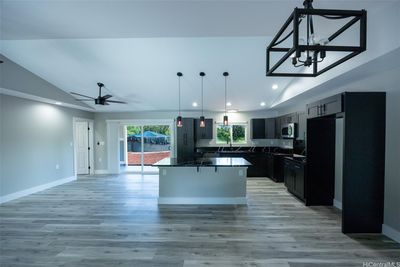 Kitchen area with island | Image 3