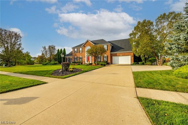 View of front of home with a garage and a front yard | Image 23