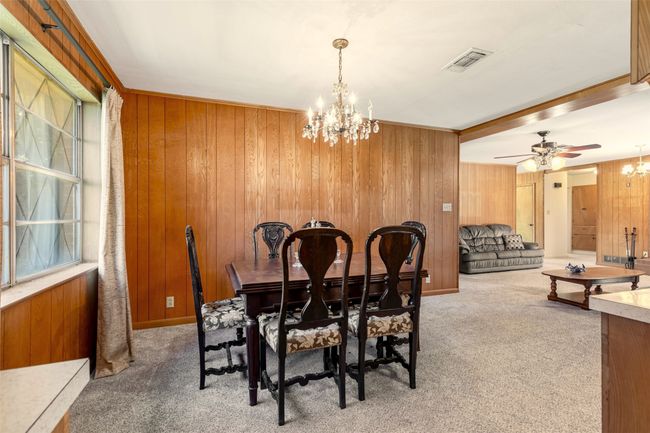 Large window in graces the dining space | Image 12
