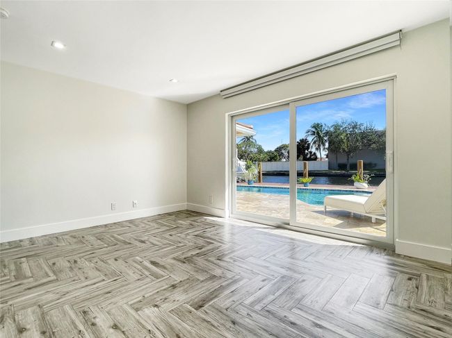 Guest bedroom overlooking the pool | Image 17