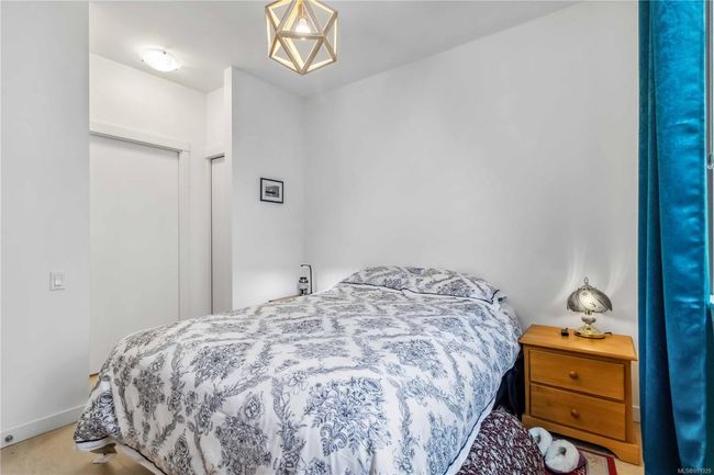 Bedroom featuring baseboards and carpet | Image 20
