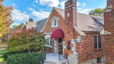 Picture of the large Front Porch, and a beautiful Japanese maple tree. | Image 3