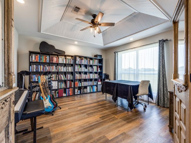 Huge home office with an enormous windows overlooking the glorious front pasture. This room could also serve as a formal dining room, home school room, music room, art studio, workout space, etc. | Image 23