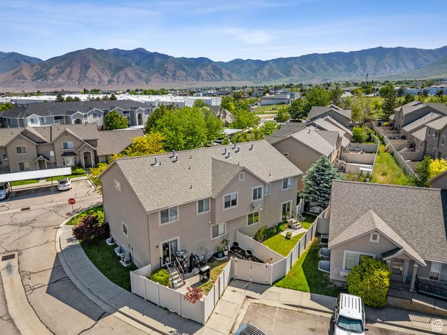 Aerial view of residential area with a mountainous background | Image 6