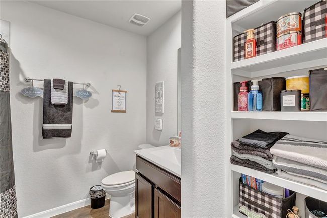 Secondary bathroom with plenty of storage space | Image 16
