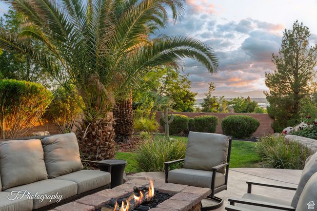 Patio terrace at dusk with an outdoor fire pit and a patio area | Image 53