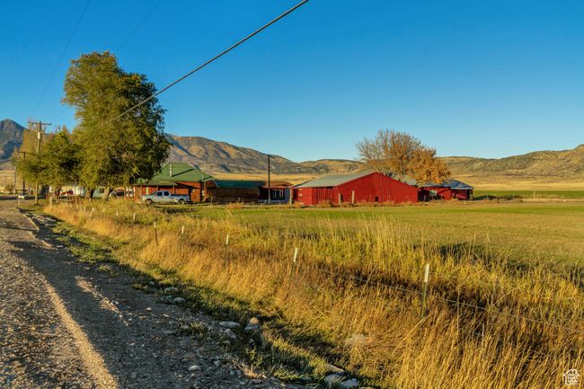 Mountain view featuring a rural view and a view of the shop building | Image 7