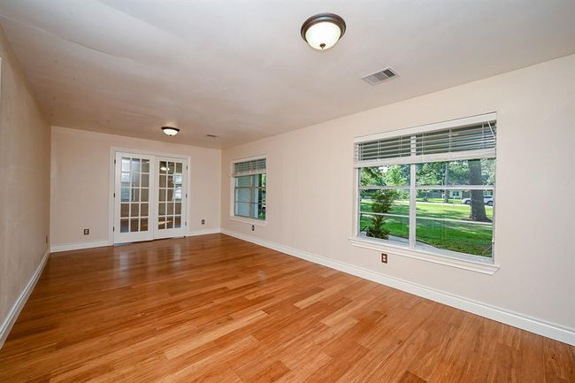 Downstairs bonus room is large enough to use as a gameroom or entertainment area for large gatherings. | Image 6